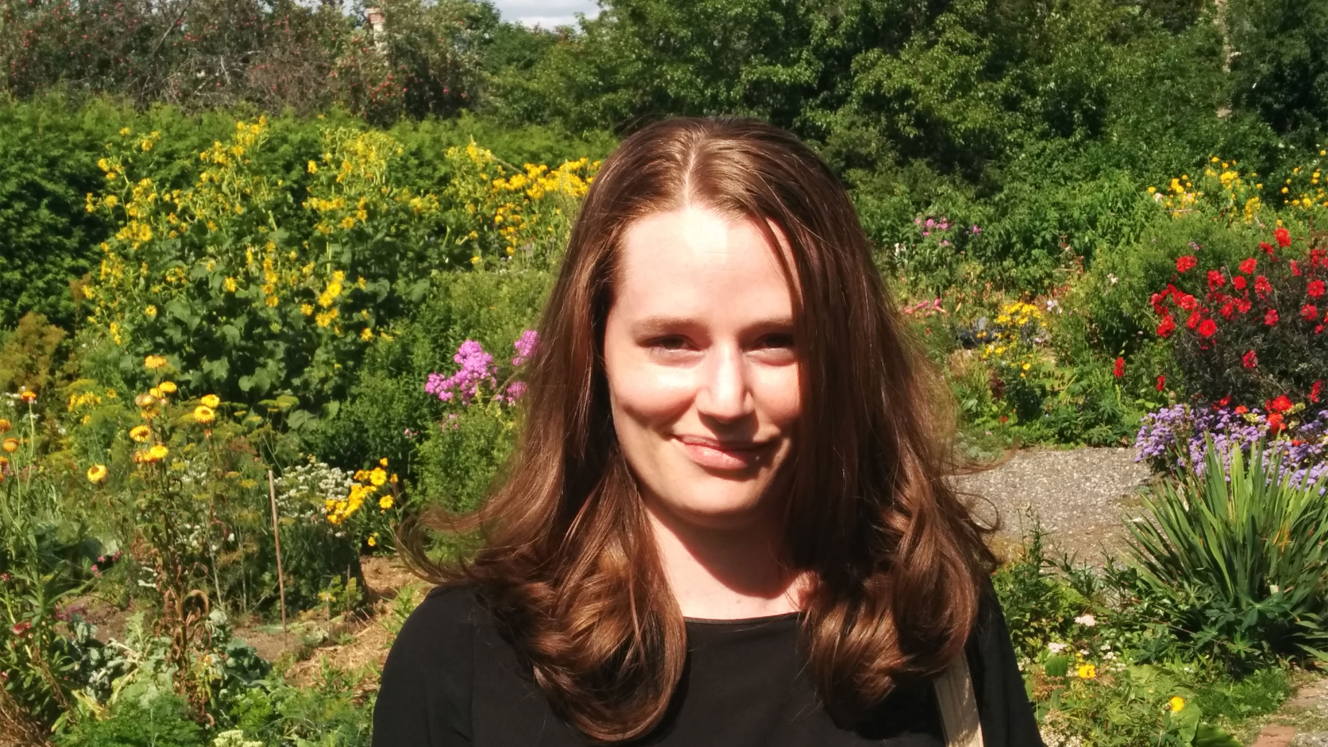 Katarina out with her husband, looking at the gardens of a local historic house, while scoping out potential wedding venues