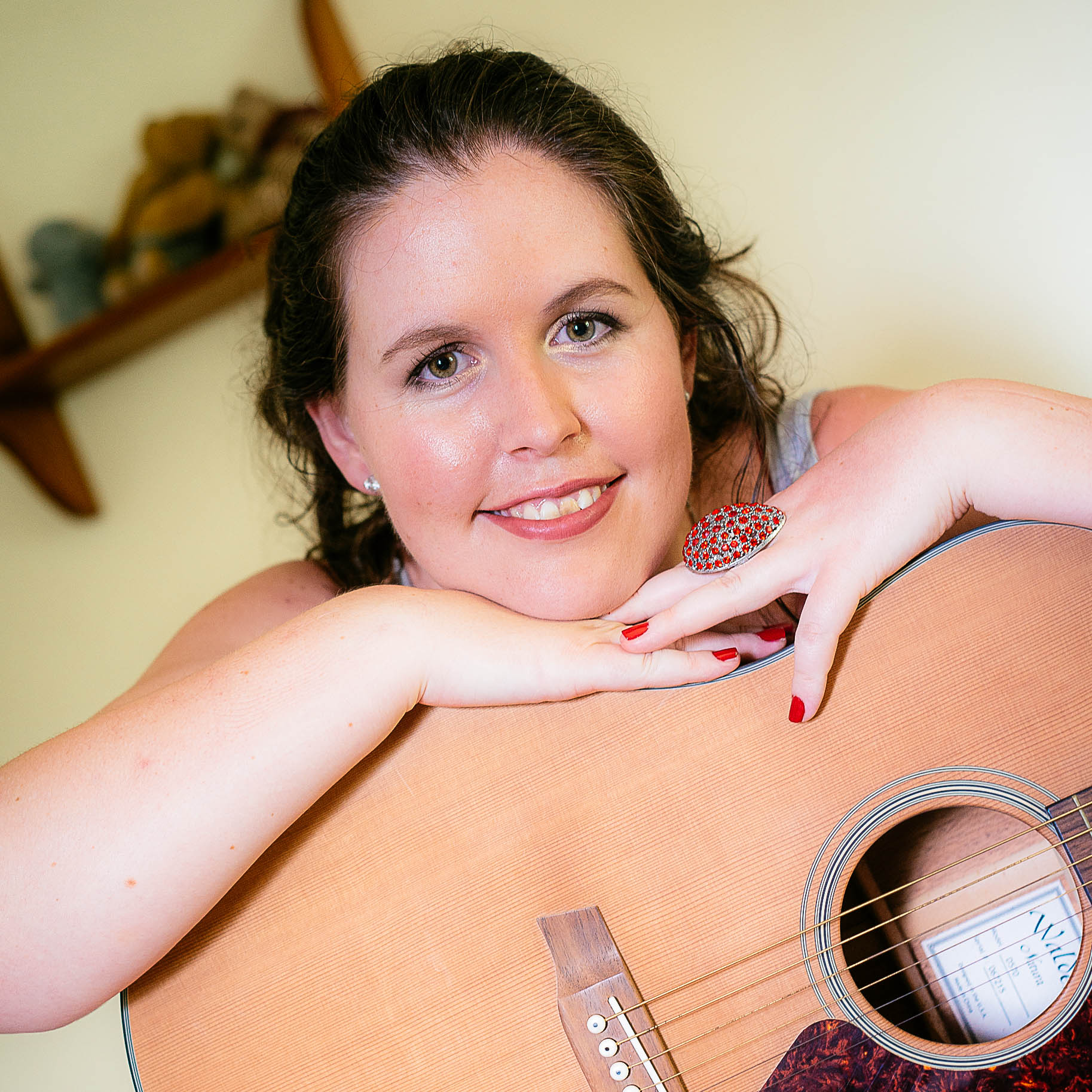 Kelly with her guitar