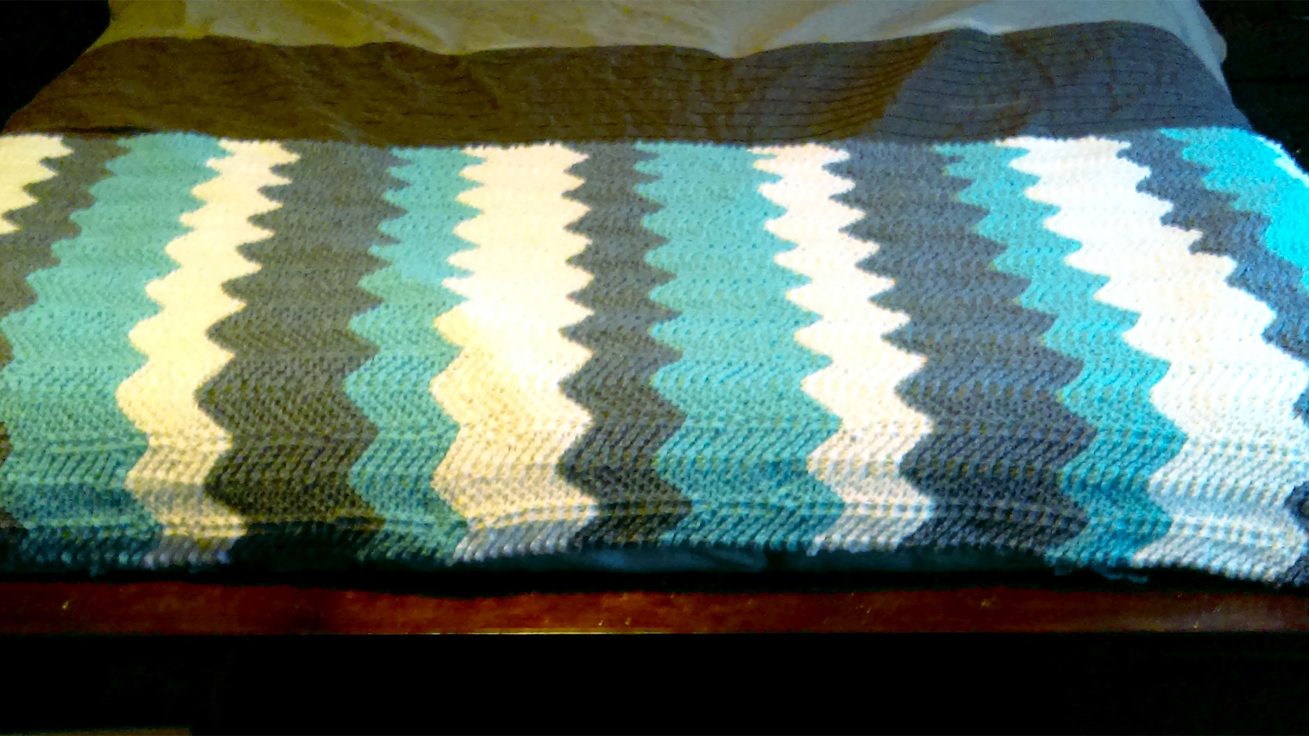 Handmade blue chevron throw blanket made by Shannon.